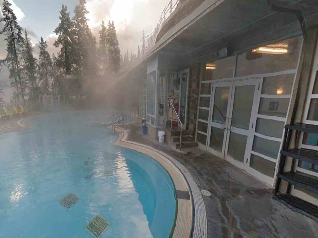 Evening soak at Banff Upper Hot Springs in winter Canada