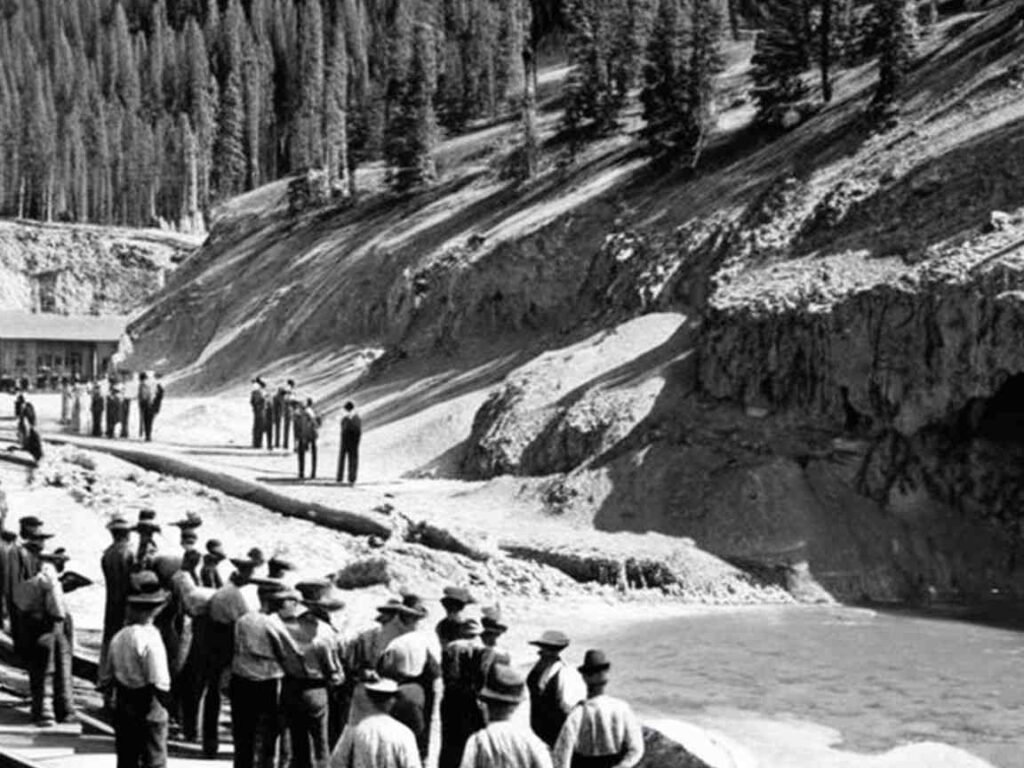 Historical photo of railway workers at the Cave and Basin Hot Springs in 1883
