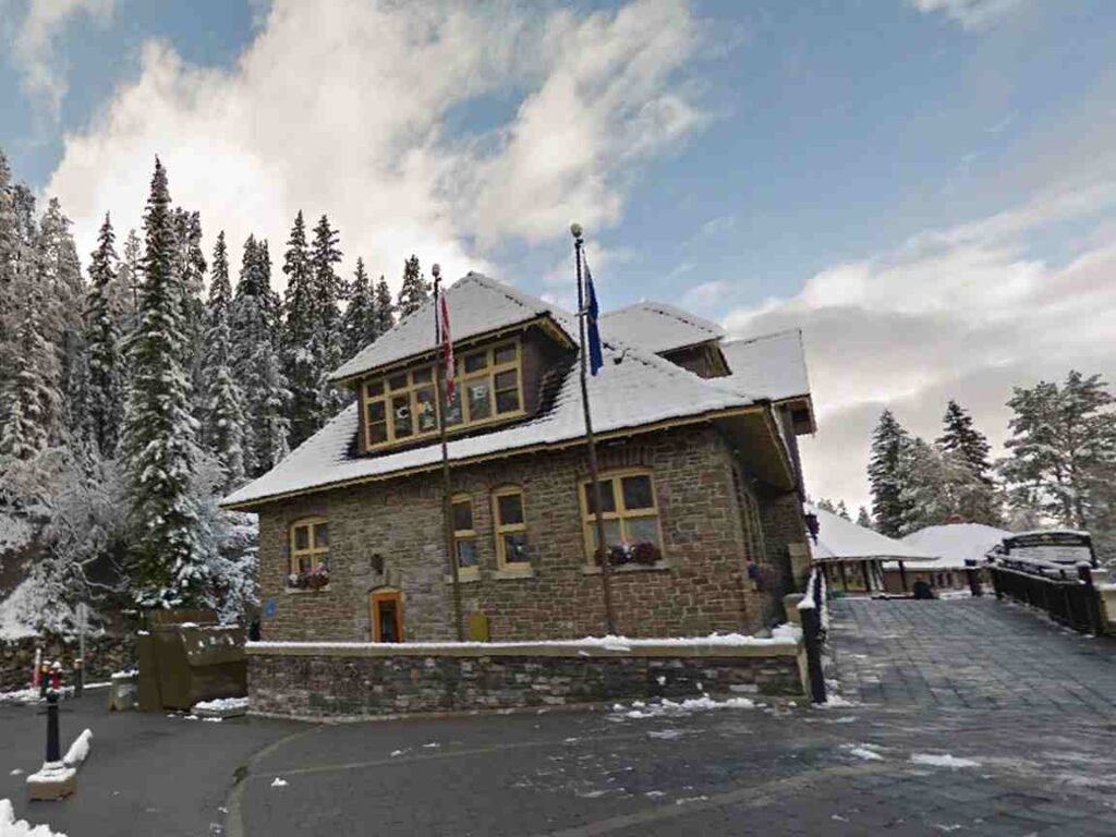 Visitors purchasing tickets at Banff Upper Hot Springs reception desk