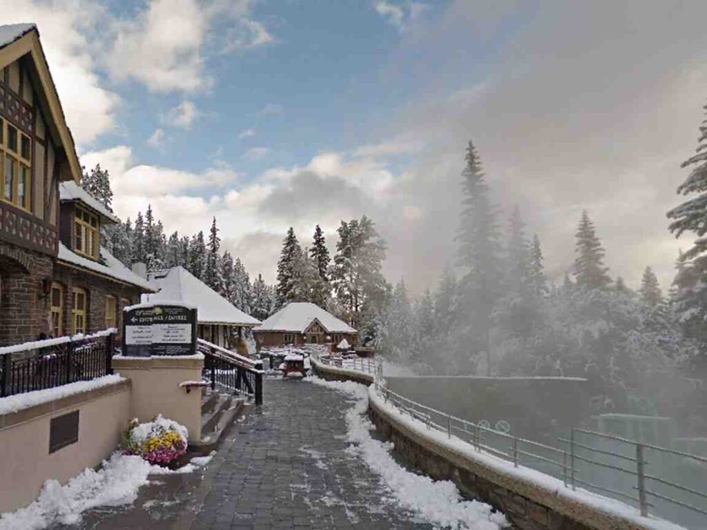 Winter scenery at Banff Upper Hot Springs with snow-dusted mountains in view